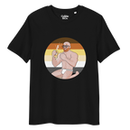 Black t-shirt featuring Aaron the beach bear posing in front of a Bear Pride Flag as suncream spurts over his tight budgie smugglers