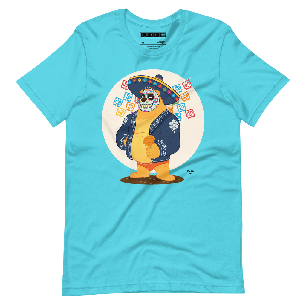Turquoise t-shirt featuring a cartoon LGBTQ+ bear character celebrating Day of the Dead, wearing a sombrero and traditional Mexican clothing