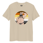 Desert dust t-shirt featuring Dougie the leather bear posing in front of a Bear Pride Flag, wearing a leather harness and jockstrap