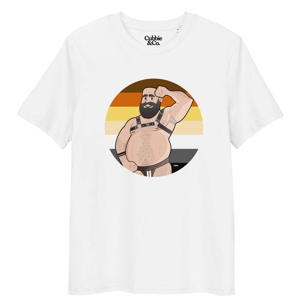 White t-shirt featuring Dougie the leather bear posing in front of a Bear Pride Flag, wearing a leather harness and jockstrap