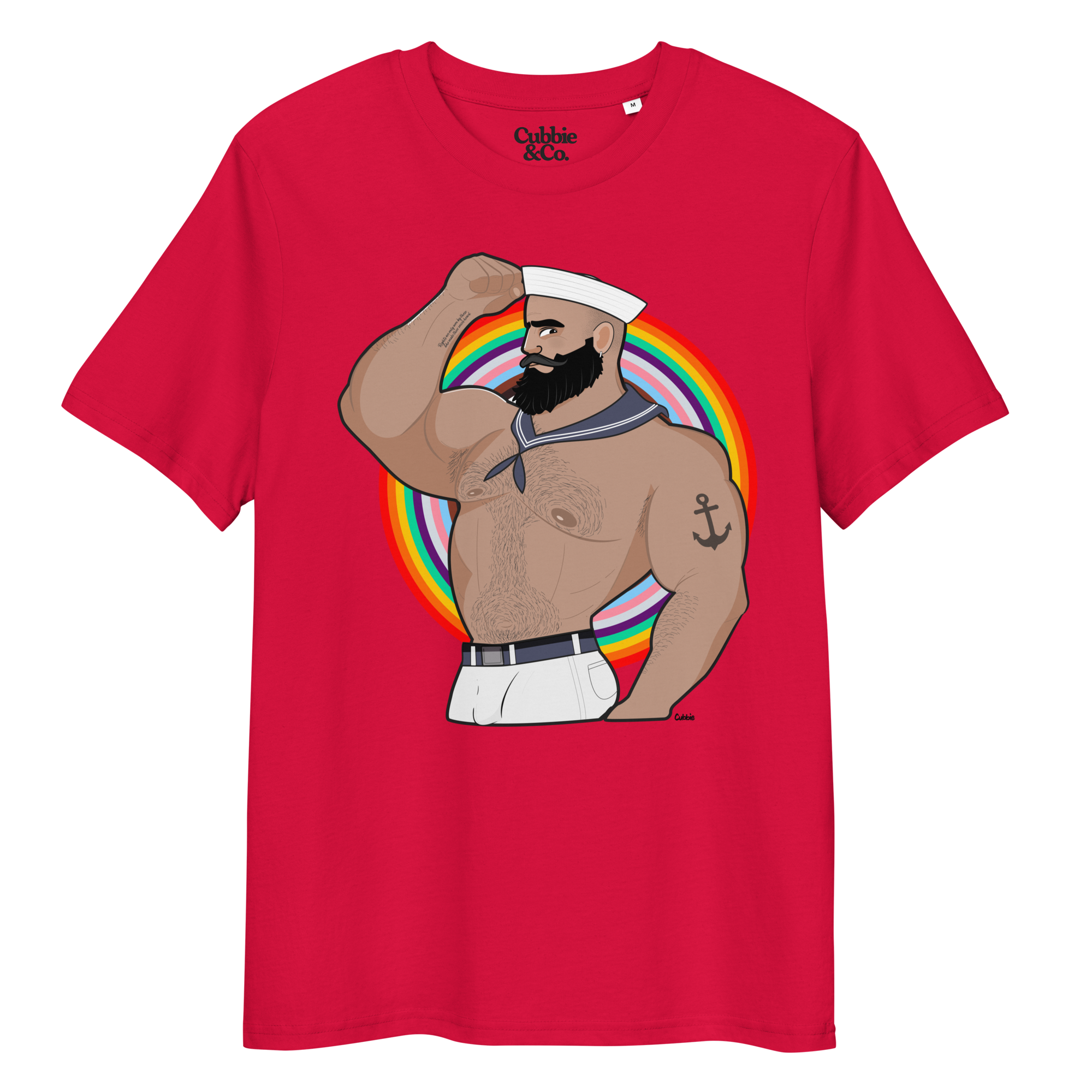 Red t-shirt featuring Kitt the sailor shirtless with white sailor hat and pants, saluting and flexing, with anchor tattoo in front of a Pride rainbow