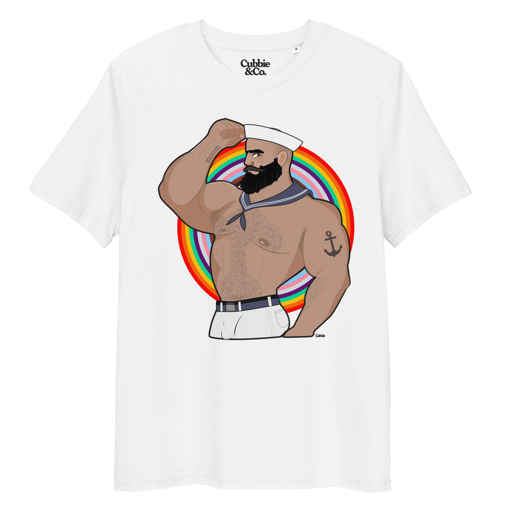 White t-shirt featuring Kitt the sailor shirtless with white sailor hat and pants, saluting and flexing, with anchor tattoo in front of a Pride rainbow