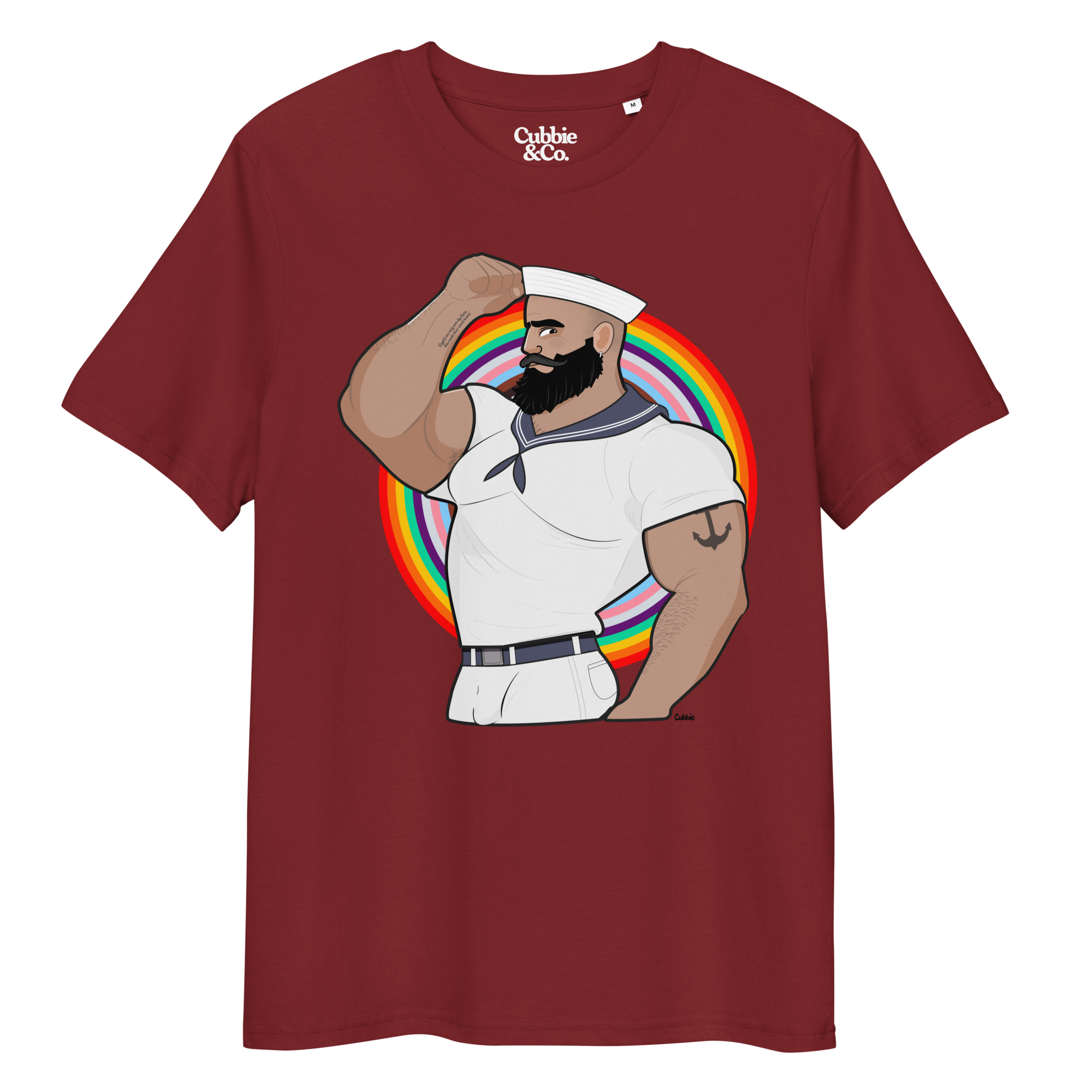 Burgundy t-shirt featuring Kitt the sailor shirtless with white sailor hat and pants, saluting and flexing, with anchor tattoo in front of a Pride rainbow