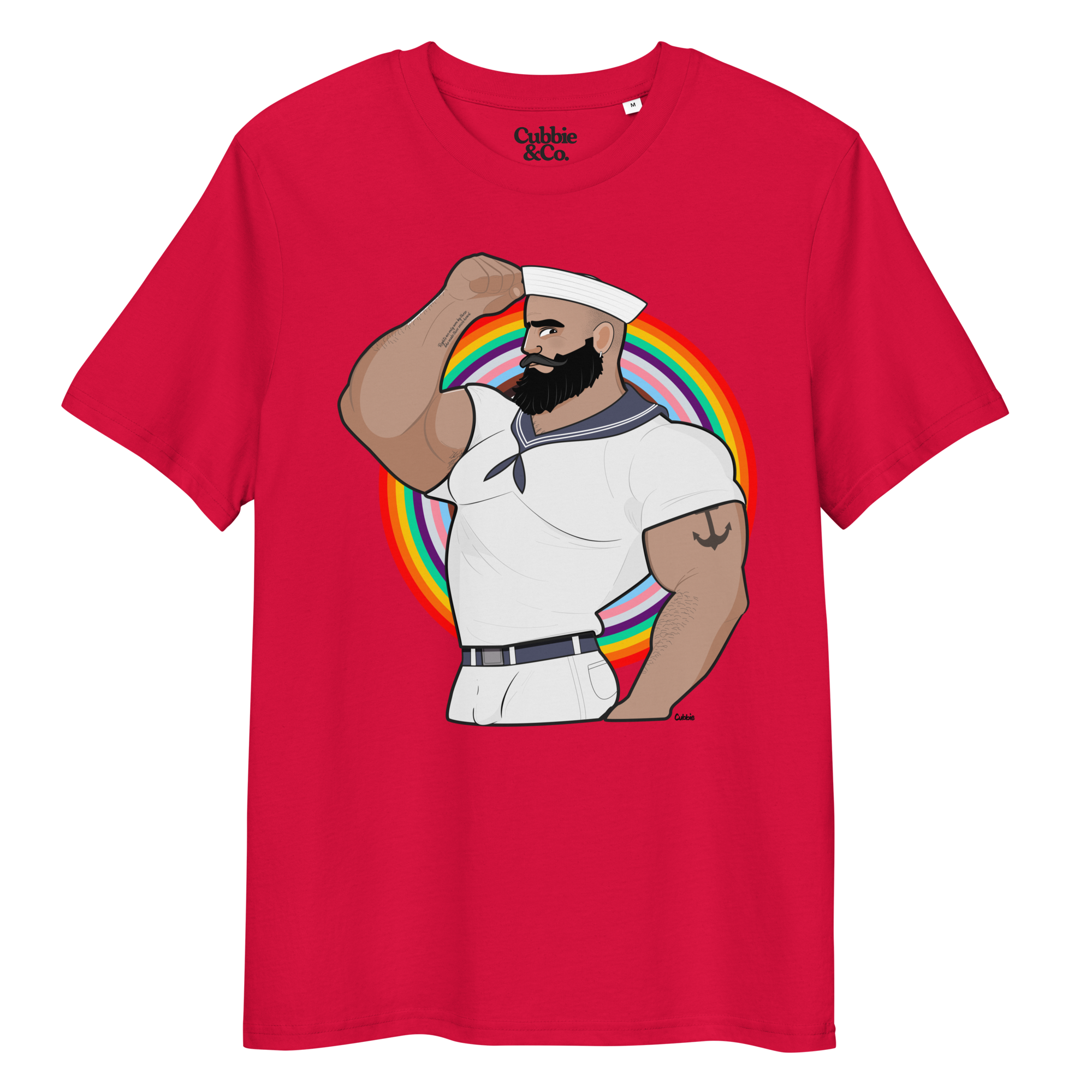 Red t-shirt featuring Kitt the sailor shirtless with white sailor hat and pants, saluting and flexing, with anchor tattoo in front of a Pride rainbow